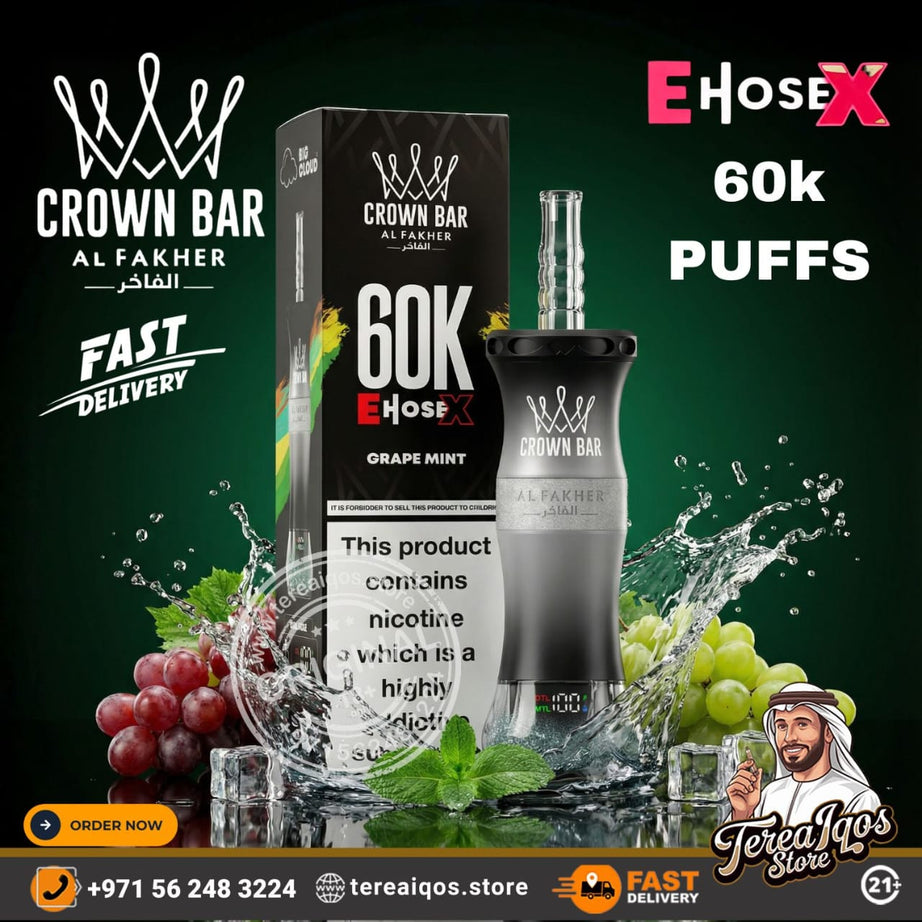 Crown Bar Al Fakher vape device with packaging and grapes on a dark background